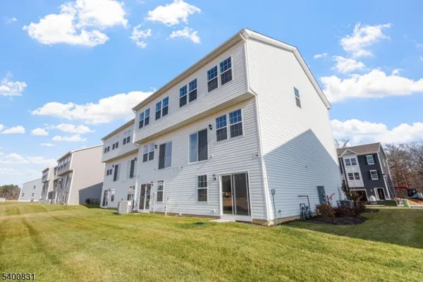 a view of a house with a swimming pool