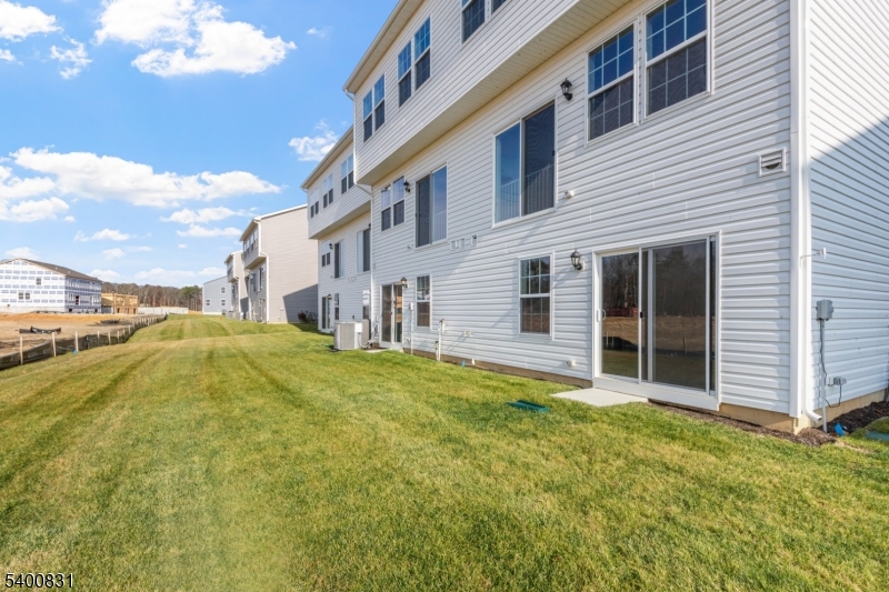 175 Mantoloking Drive Jackson, NJ 08527 - Photo 24 of 25 a view of a house with a swimming pool