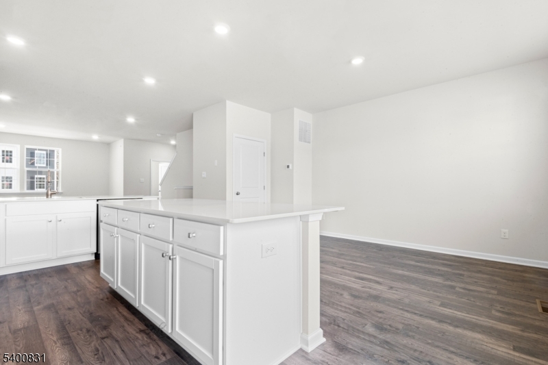 175 Mantoloking Drive Jackson, NJ 08527 - Photo 4 of 25 a kitchen with white cabinets