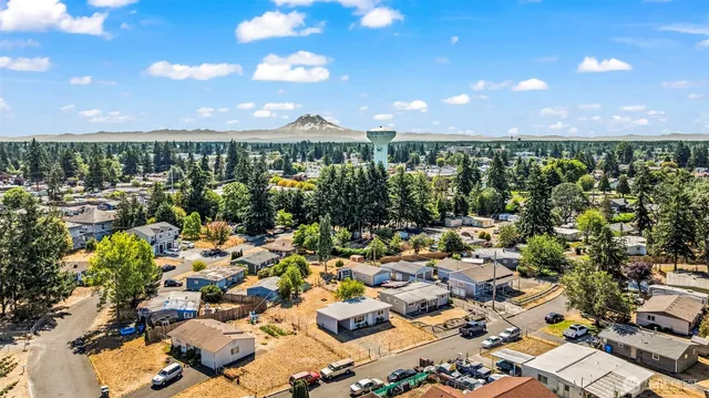 a house view with a backyard space