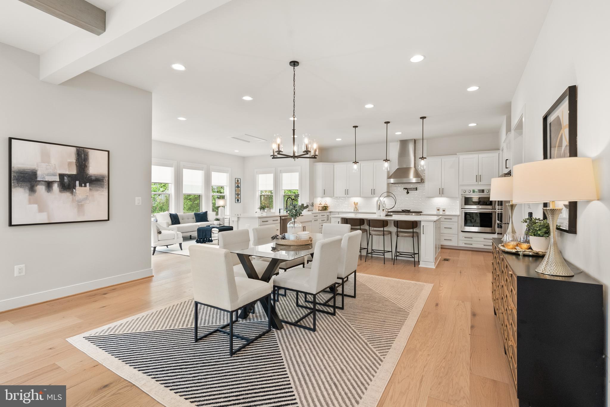 1212 Drake Street Southwest Vienna, VA 22180 - Photo 25 of 84 a dining room with stainless steel appliances furniture a rug kitchen view and a chandelier