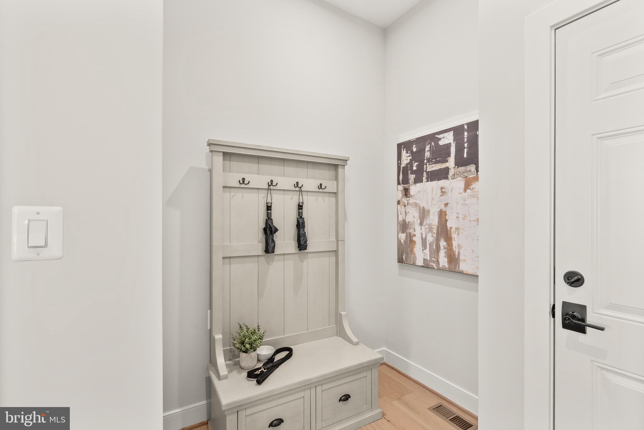 1212 Drake Street Southwest Vienna, VA 22180 - Photo 36 of 84 a bathroom with a sink a mirror and vanity
