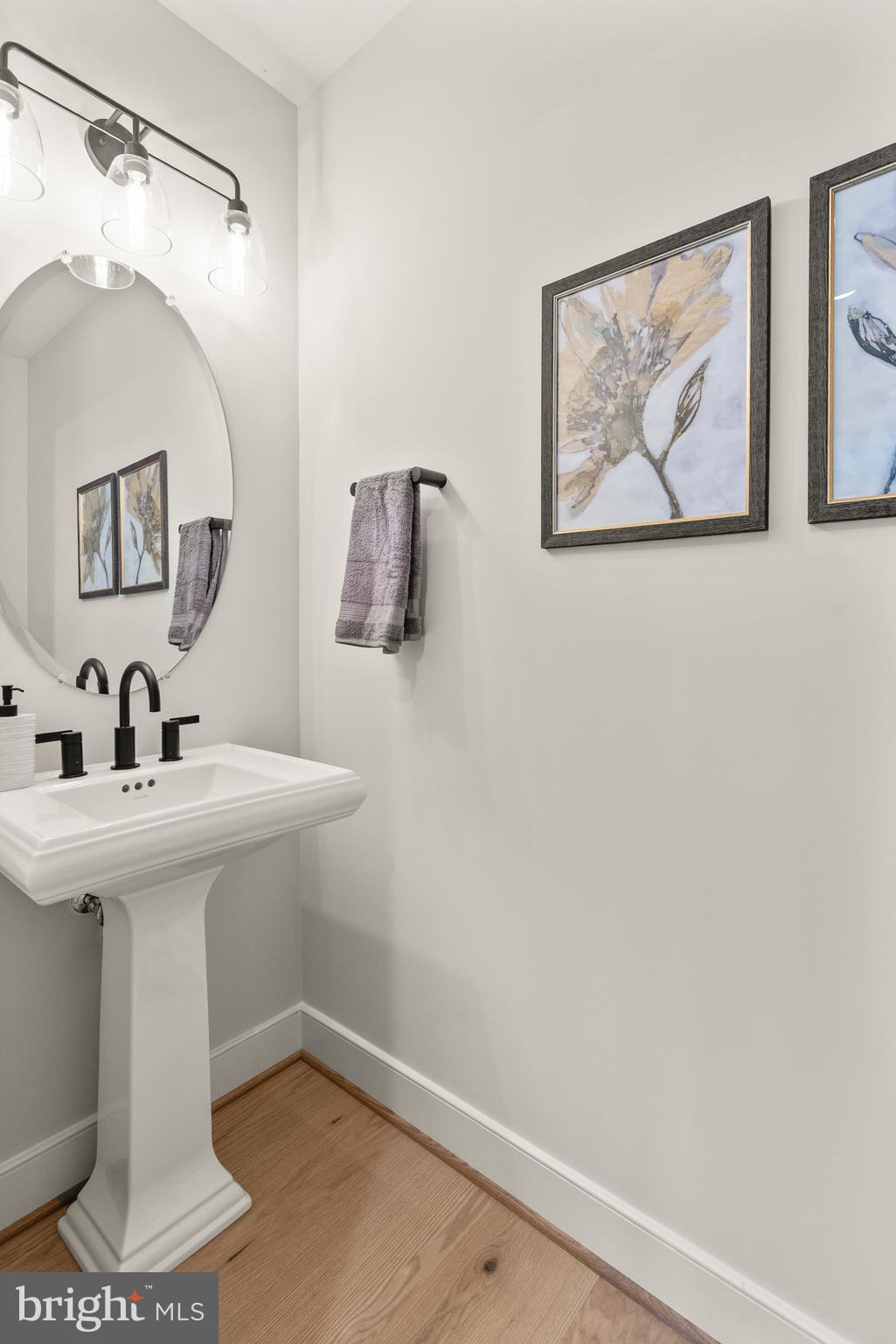 1212 Drake Street Southwest Vienna, VA 22180 - Photo 38 of 84 a bathroom with a sink and mirror