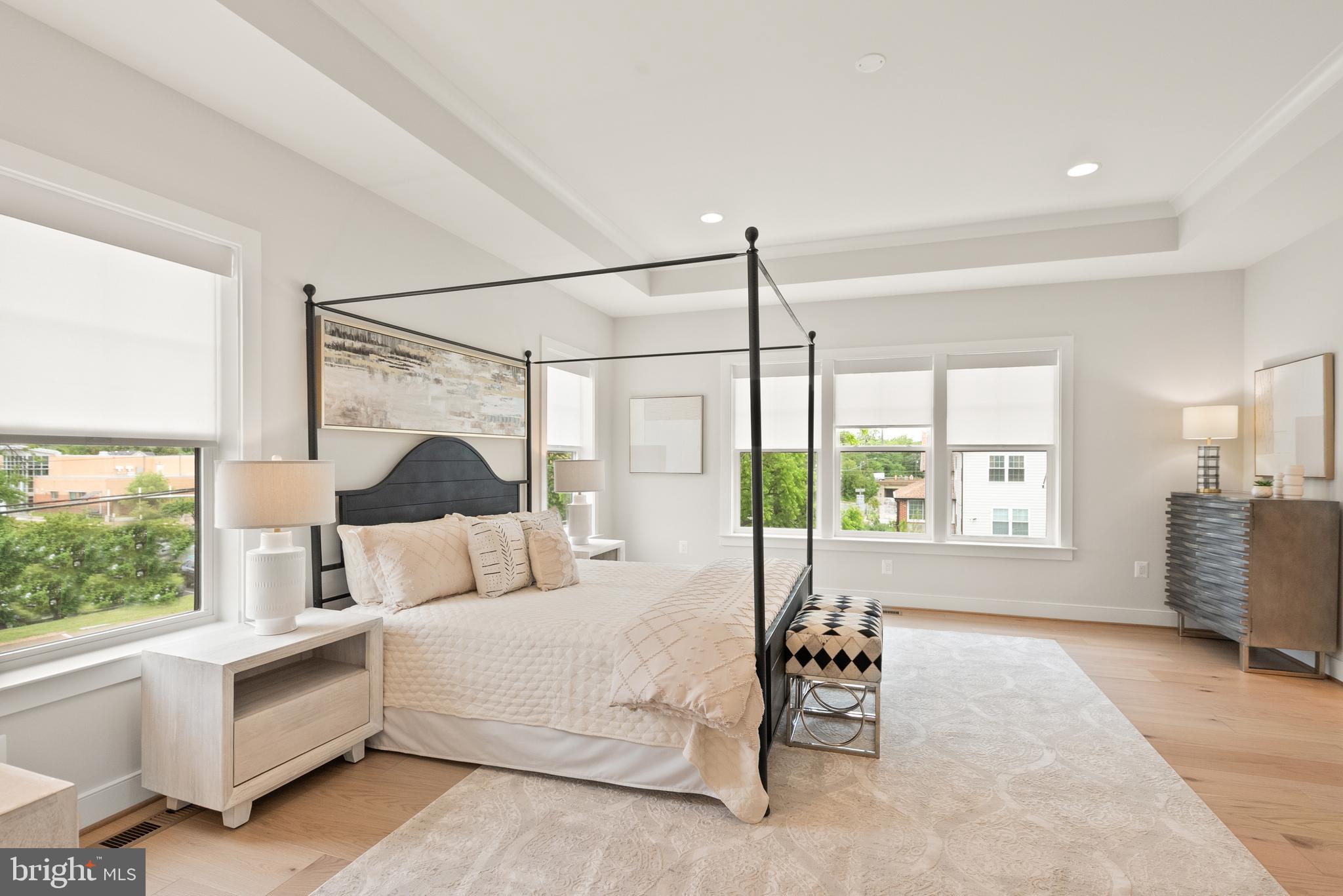 1212 Drake Street Southwest Vienna, VA 22180 - Photo 42 of 84 a spacious bedroom with a bed and a large window
