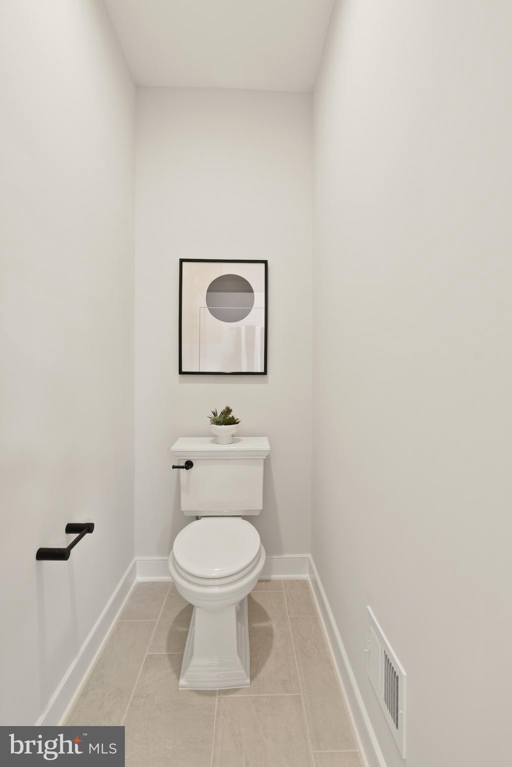 1212 Drake Street Southwest Vienna, VA 22180 - Photo 49 of 84 a bathroom with a toilet and a sink