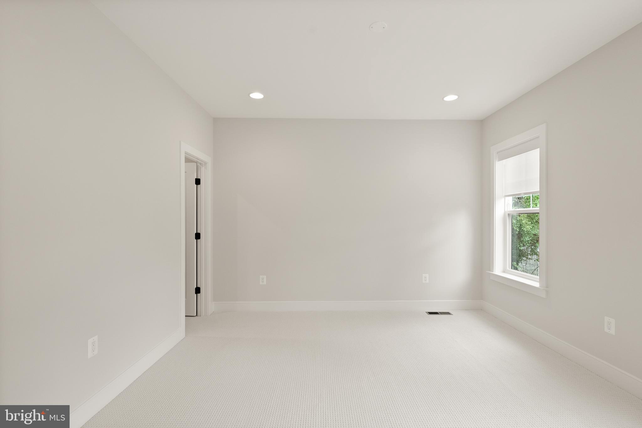 1212 Drake Street Southwest Vienna, VA 22180 - Photo 57 of 84 an empty room with windows