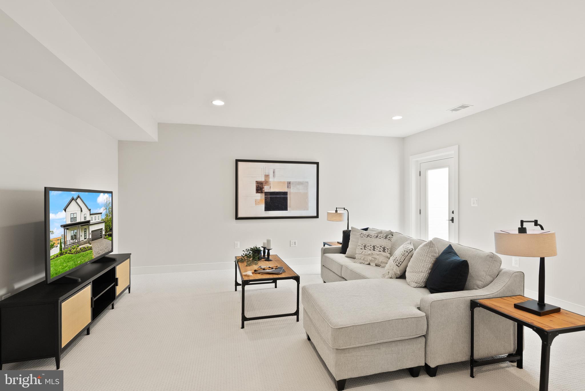 1212 Drake Street Southwest Vienna, VA 22180 - Photo 68 of 84 a living room with furniture and a flat screen tv