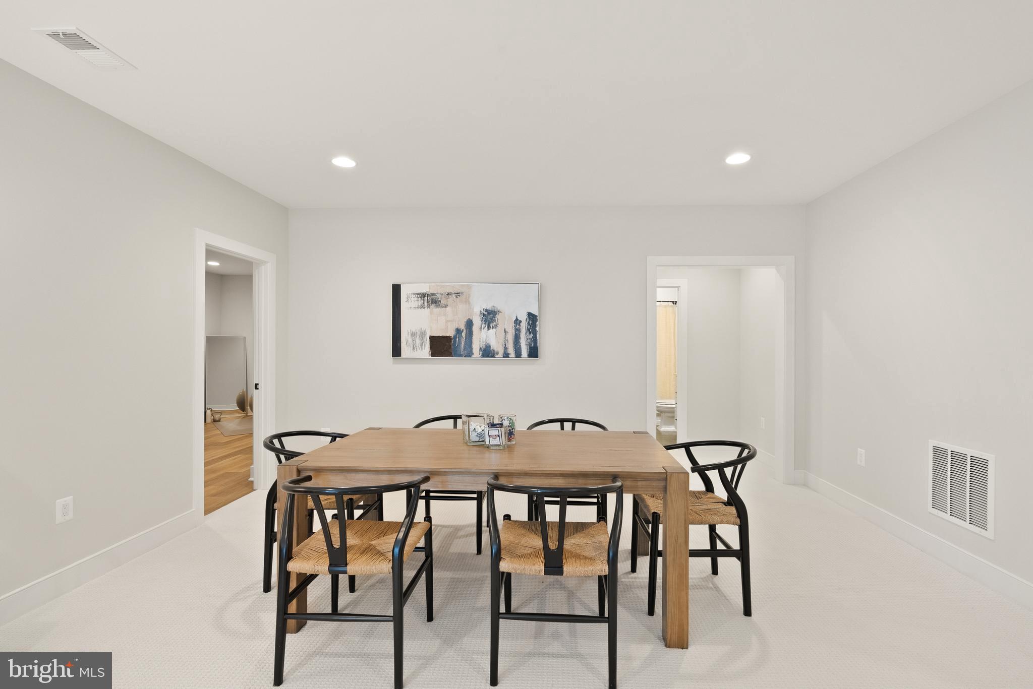 1212 Drake Street Southwest Vienna, VA 22180 - Photo 71 of 84 a view of a dining room with furniture and a table