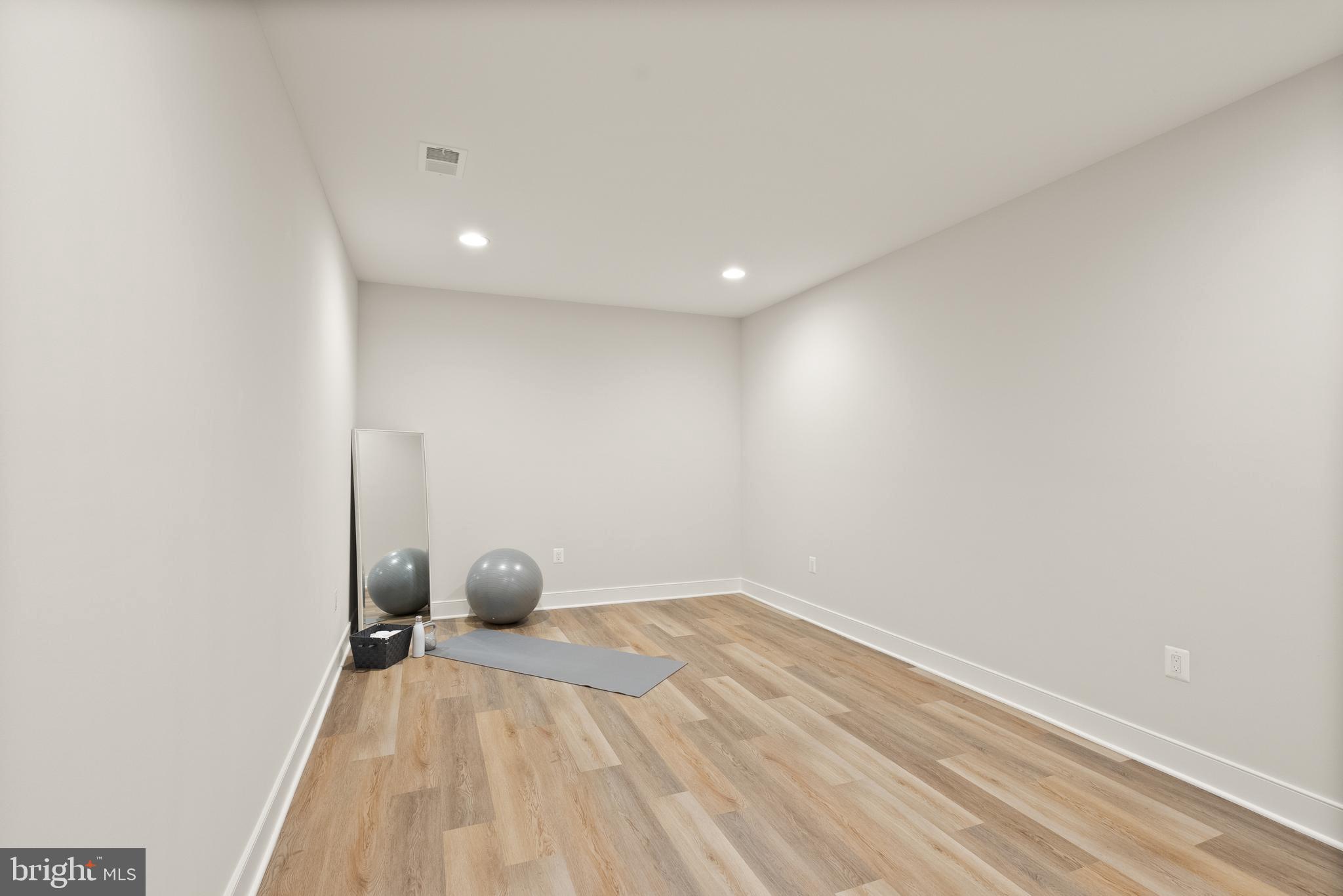 1212 Drake Street Southwest Vienna, VA 22180 - Photo 79 of 84 a view of a room with wooden floor