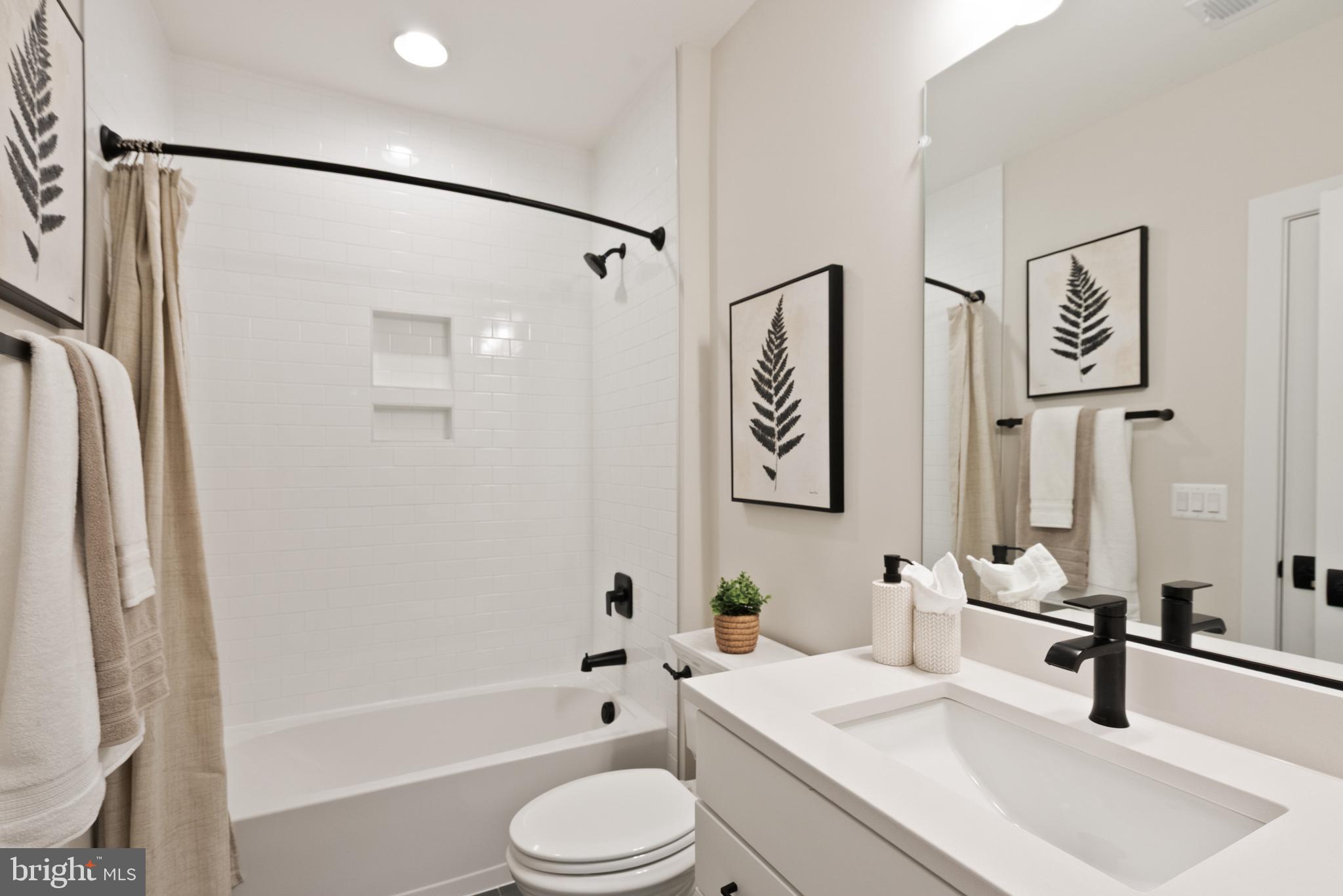 1212 Drake Street Southwest Vienna, VA 22180 - Photo 84 of 84 a bathroom with a sink toilet and shower