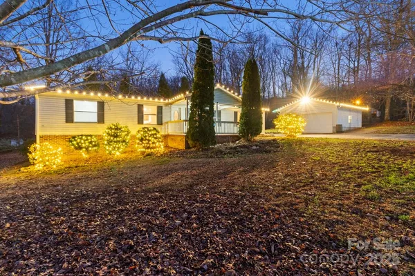 a view of a house with a big yard