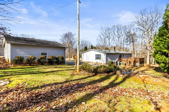 a view of a house with a street
