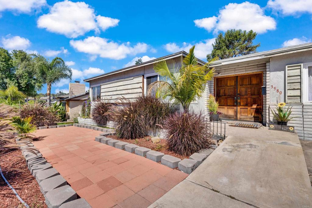 a house view with a outdoor space