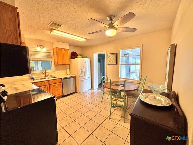 a view of a terrace with seating area