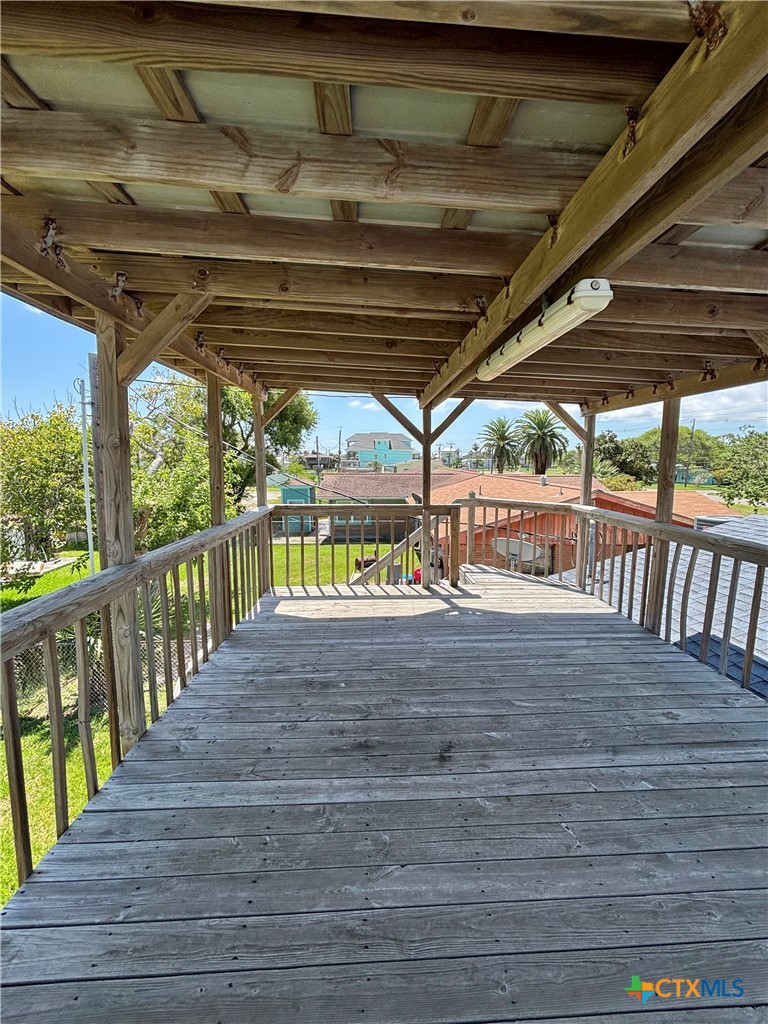208 Washington Boulevard Port O'Connor, TX 77982 - Photo 20 of 47 a view of a porch