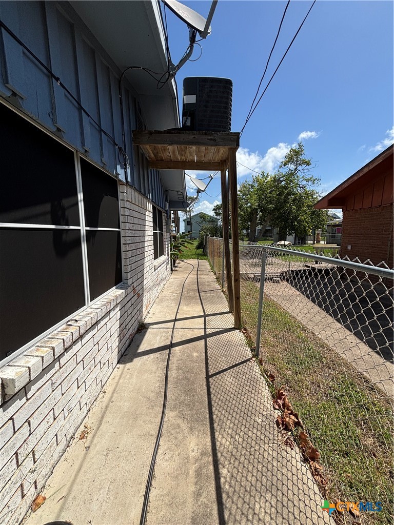 208 Washington Boulevard Port O'Connor, TX 77982 - Photo 33 of 47 a view of balcony with wooden floor