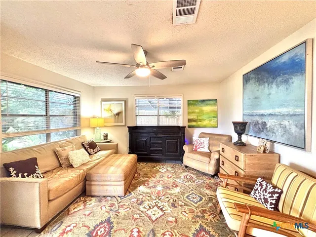 a bed room with a bed and a window