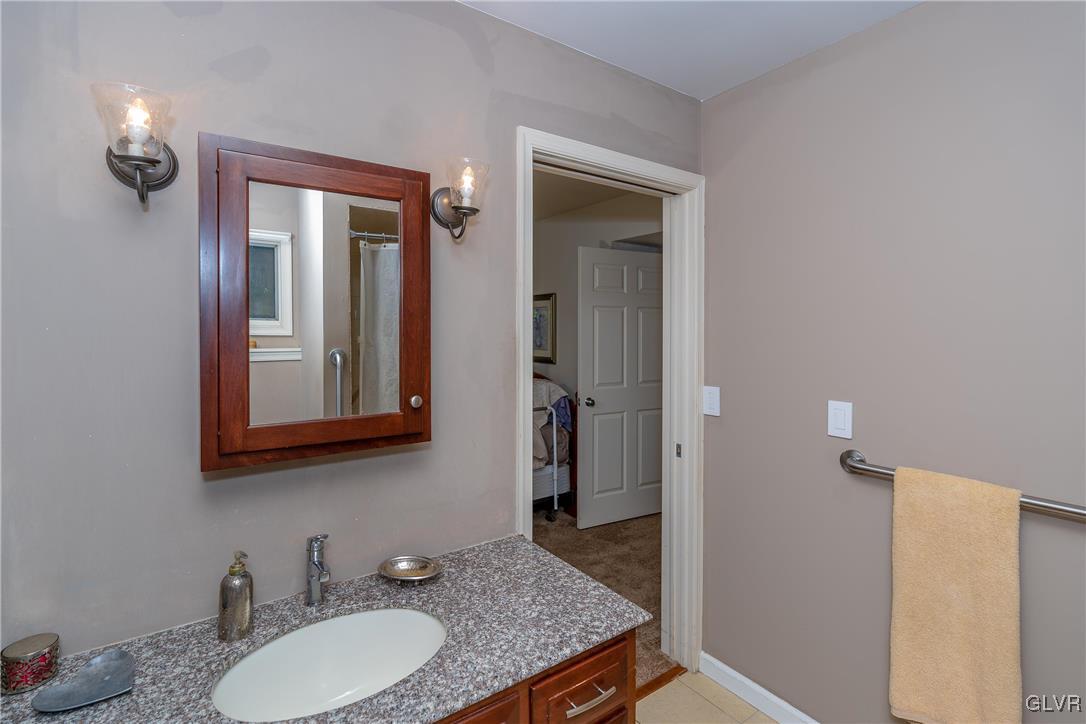 6774 Tollgate Road Zionsville, PA 18092 - Photo 14 of 25 Master bath with tile floor and granite countertop
