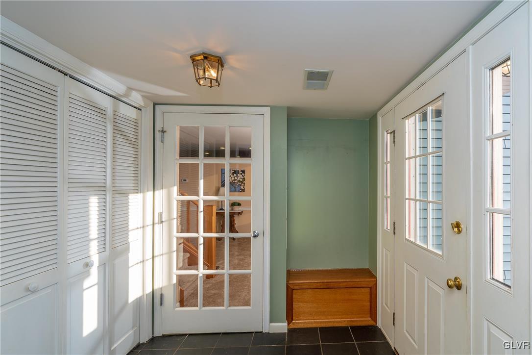 6774 Tollgate Road Zionsville, PA 18092 - Photo 19 of 25 Foyer between living area and garage/mudroom