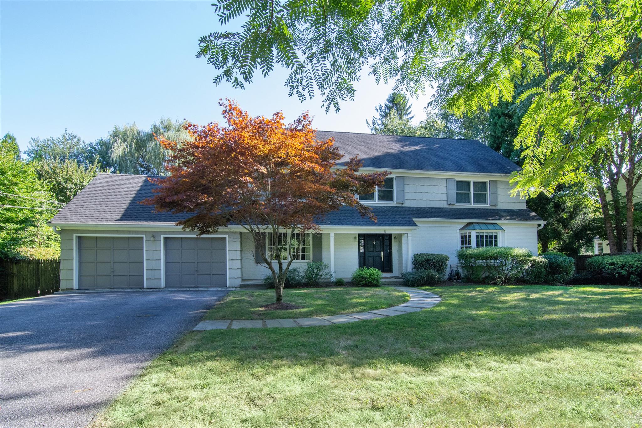 8 Hudson Road East Irvington, NY 10533 - Photo 1 of 1 a front view of a house with a garden