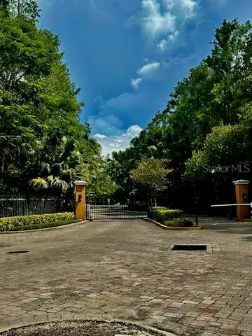 a view of a swimming pool with a bench