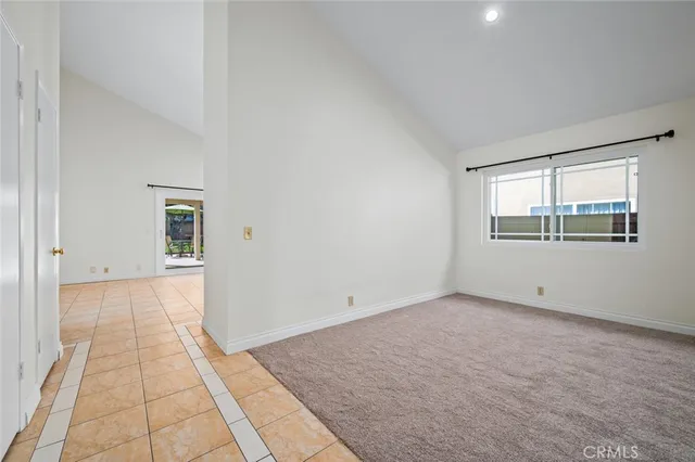 a kitchen with stainless steel appliances a refrigerator and a stove top oven