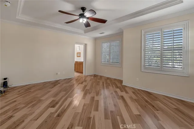 a bathroom with a granite countertop sink mirror and a bathtub