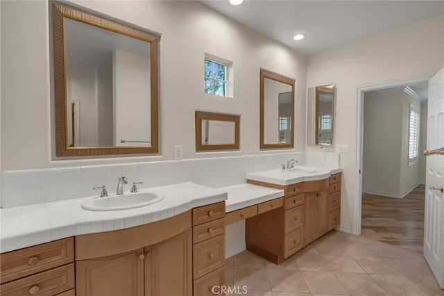 a white bath tub and shower