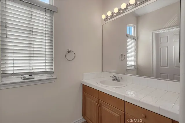 a utility room with sink dryer and washer