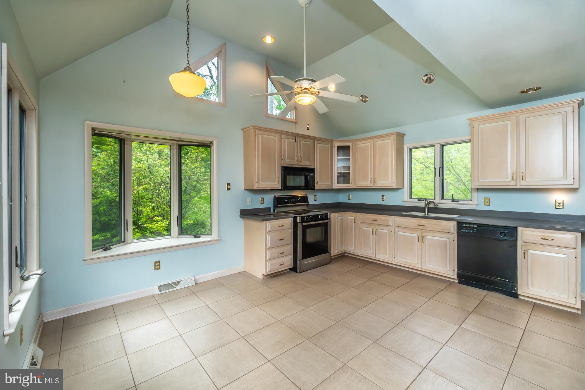 20 Hunter Road Coatesville, PA 19320 - Photo 12 of 35 Bright, airy kitchen with nature views.