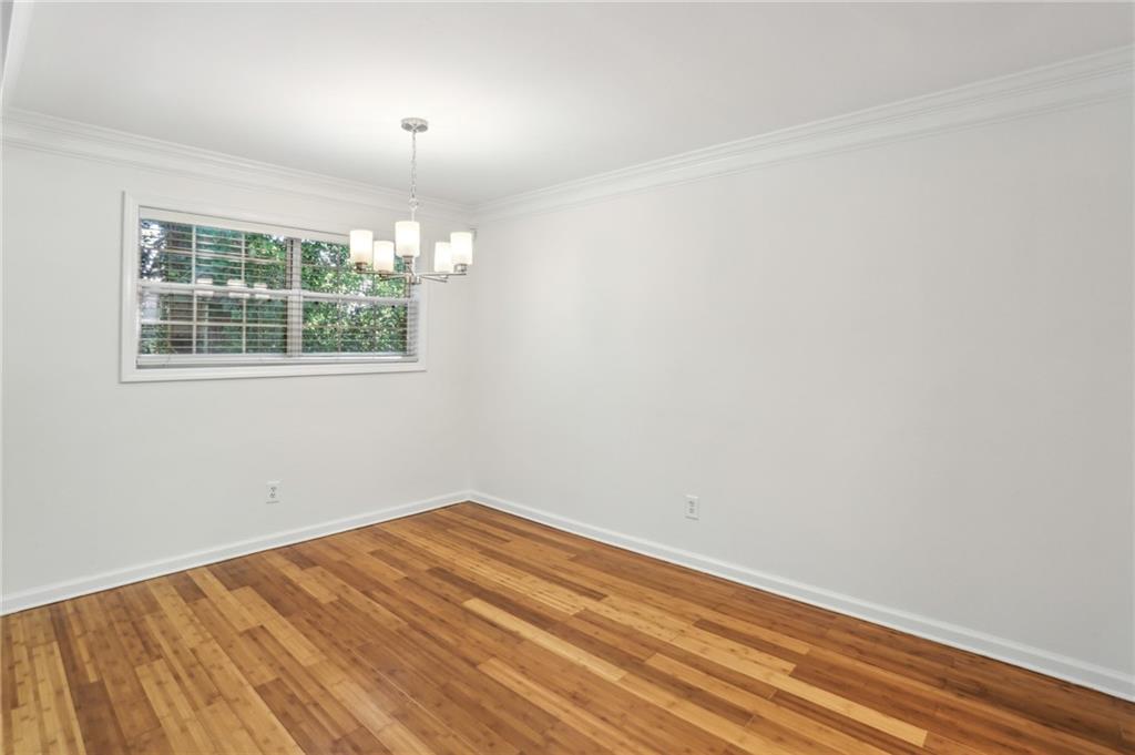 311 Peachtree Hills Avenue Northeast, Unit 13B Atlanta, GA 30305 - Photo 13 of 30 an empty room with a window