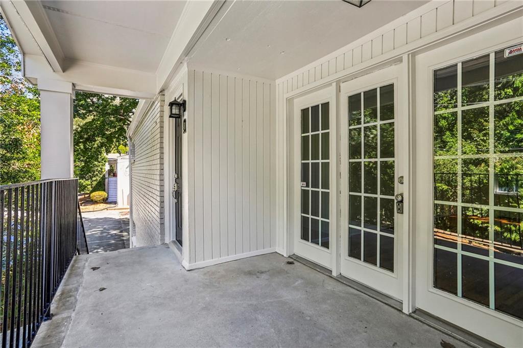 311 Peachtree Hills Avenue Northeast, Unit 13B Atlanta, GA 30305 - Photo 5 of 30 a view of empty room with windows