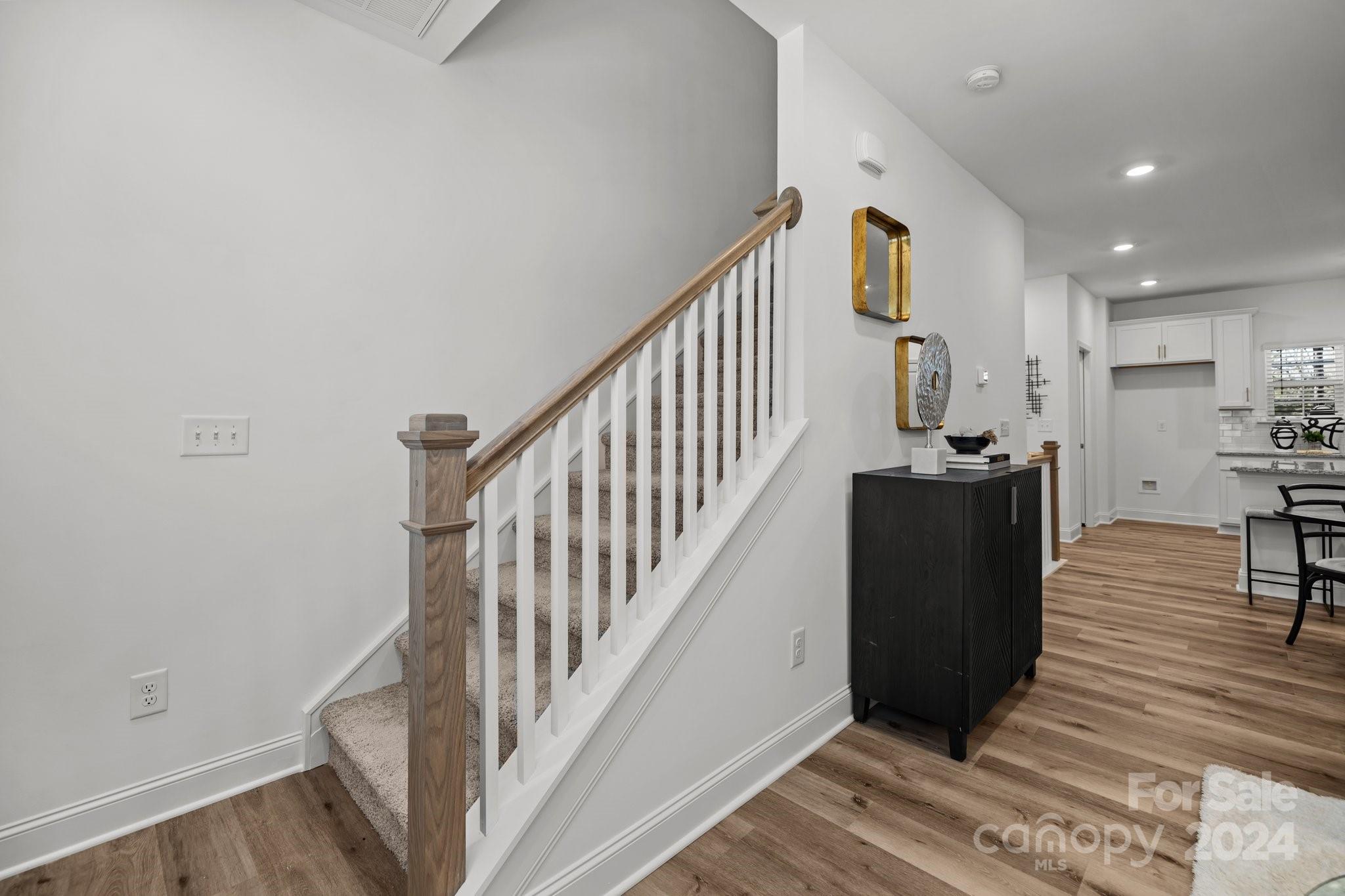 3018 Butler Hl Drive Matthews, NC 28105 - Photo 11 of 20 a view of entryway with wooden floor and stairs