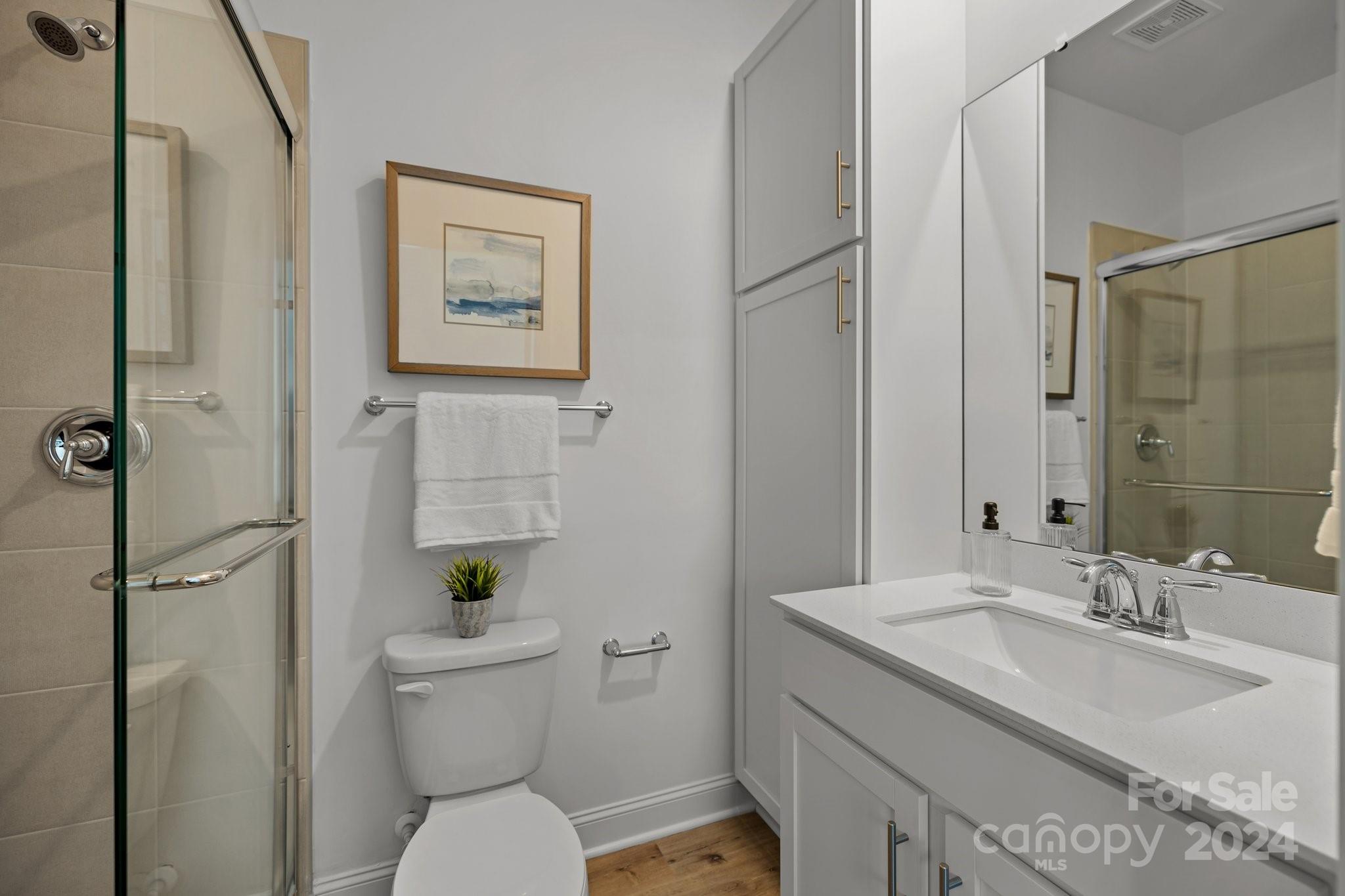 3018 Butler Hl Drive Matthews, NC 28105 - Photo 16 of 20 a bathroom with a sink toilet and shower