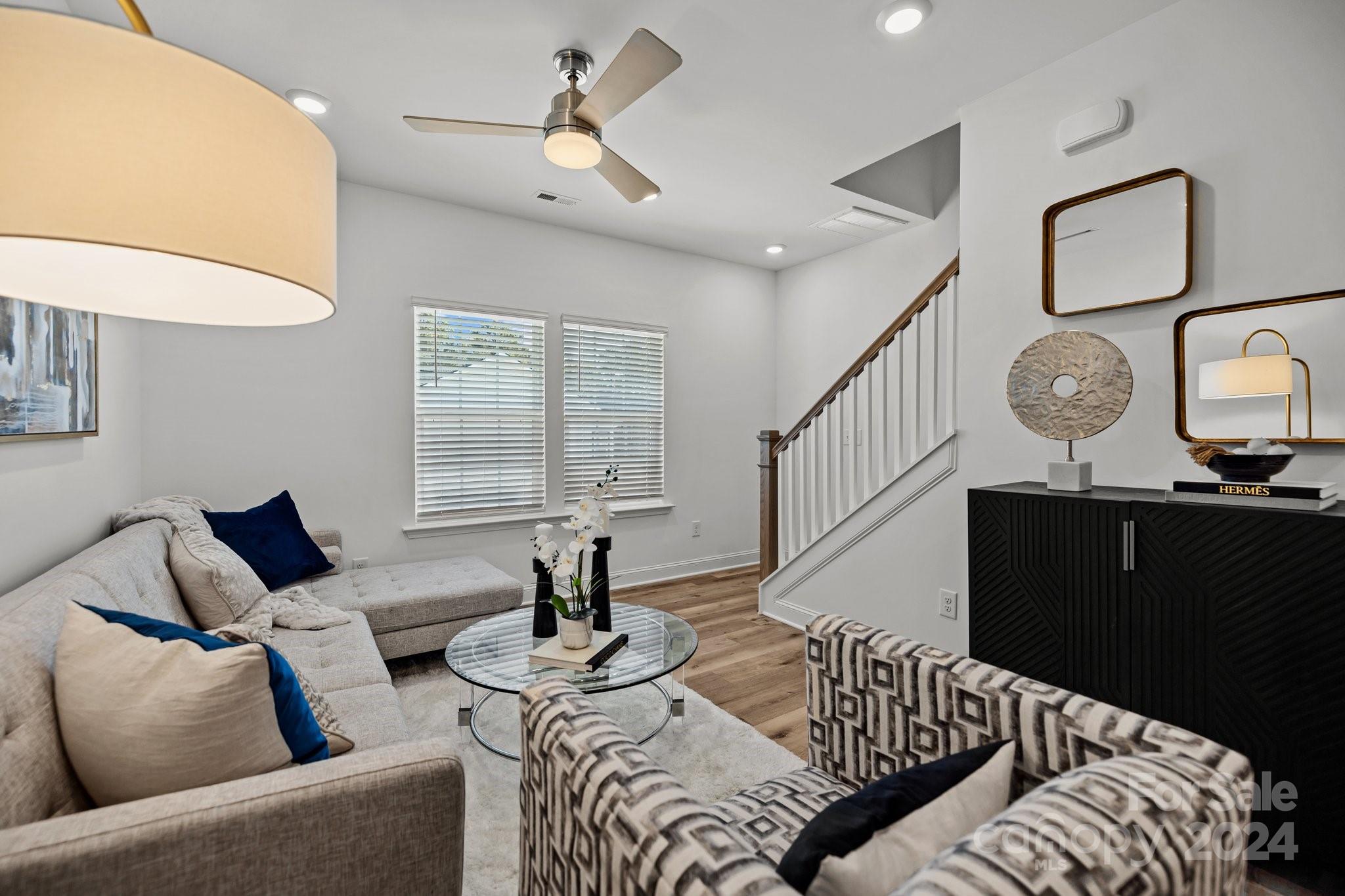 3018 Butler Hl Drive Matthews, NC 28105 - Photo 9 of 20 a living room with furniture and wooden floor