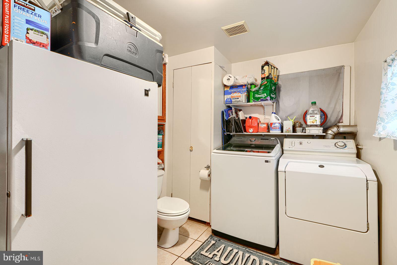 1516 Boyle Street Baltimore, MD 21230 - Photo 16 of 29 a utility room with dryer and washer