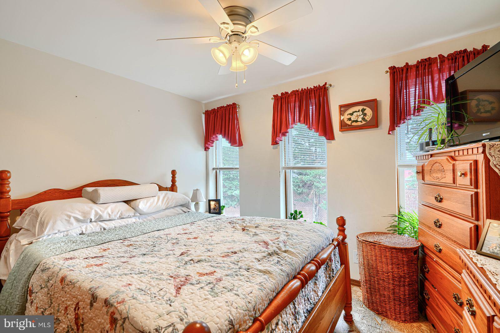 1516 Boyle Street Baltimore, MD 21230 - Photo 18 of 29 a bedroom with bed and window