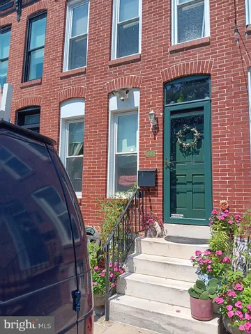 a front view of a house with a porch
