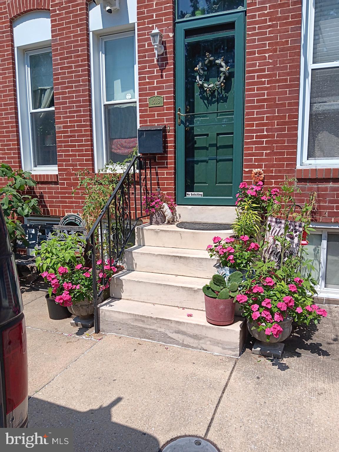 1516 Boyle Street Baltimore, MD 21230 - Photo 4 of 29 a view of a house with flower pots