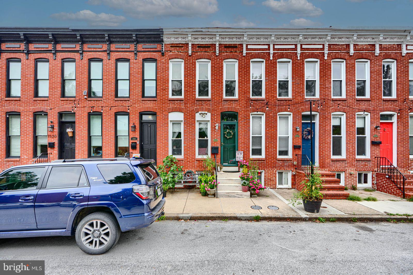 1516 Boyle Street Baltimore, MD 21230 - Photo 5 of 29 a car parked in front of a building