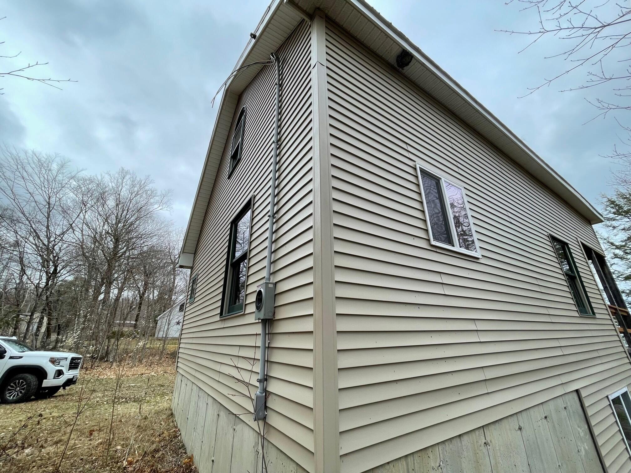 391 Boulder Road Danforth, ME 04424 - Photo 9 of 25 Exterior Photo (West Wall)