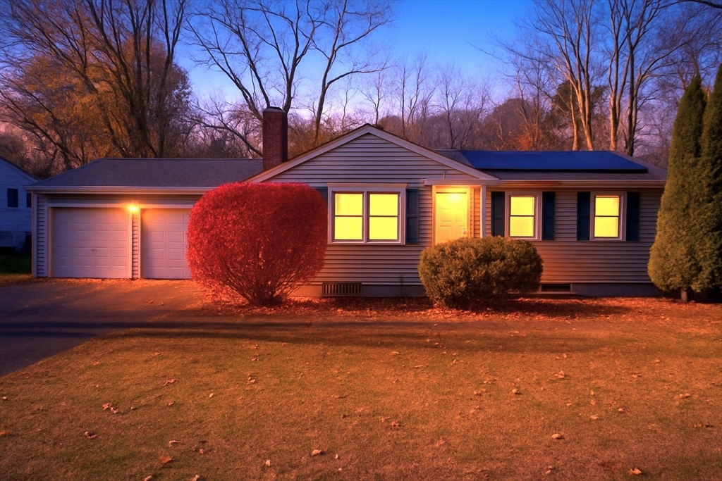 a view of house with outdoor space