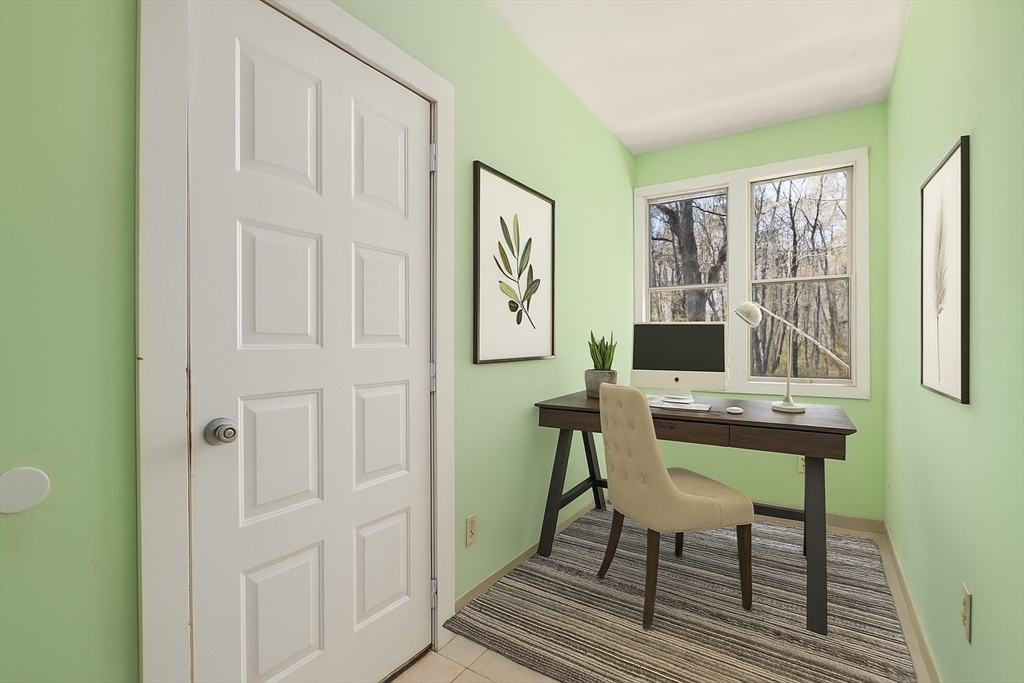 186 Bolton Street Springfield, MA 01119 - Photo 17 of 34 a view of a workspace with furniture and a window