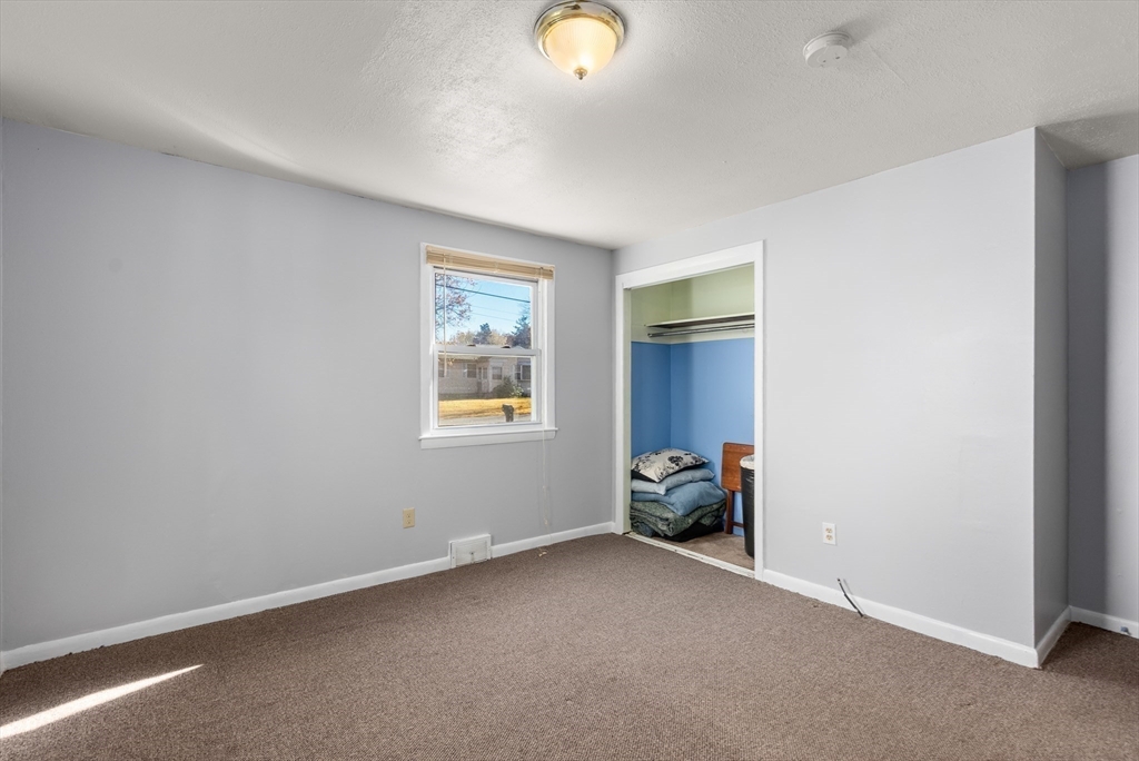 186 Bolton Street Springfield, MA 01119 - Photo 21 of 34 a view of a livingroom with furniture and window