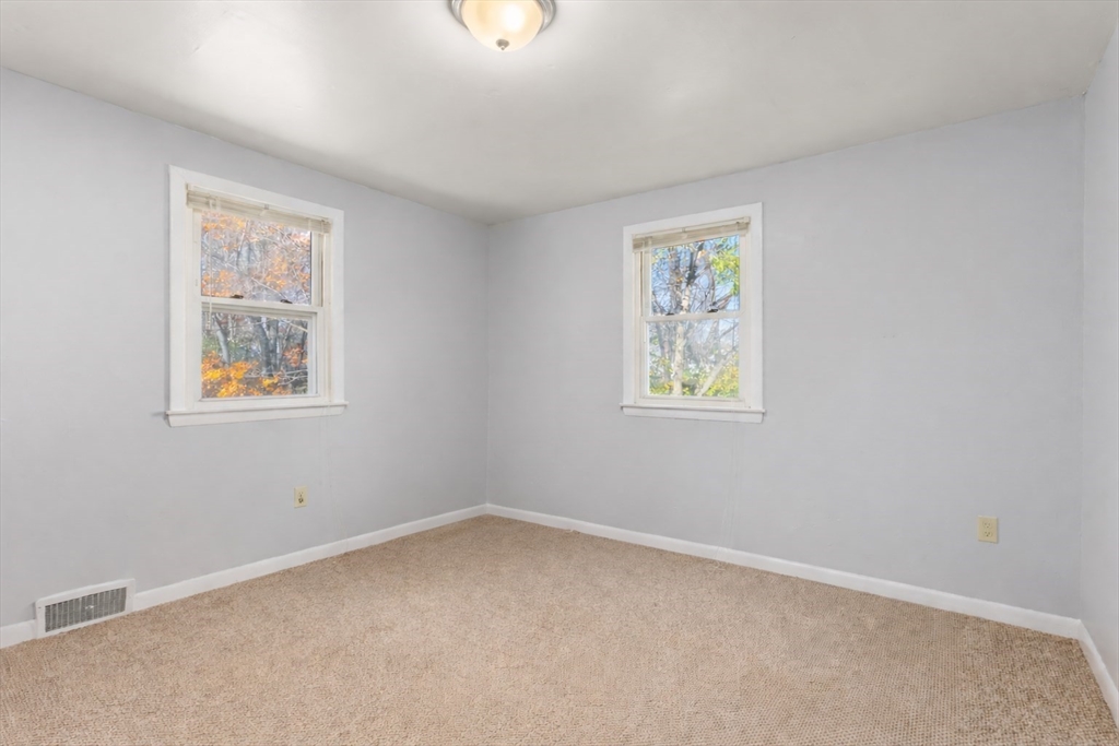 186 Bolton Street Springfield, MA 01119 - Photo 24 of 34 an empty room with windows