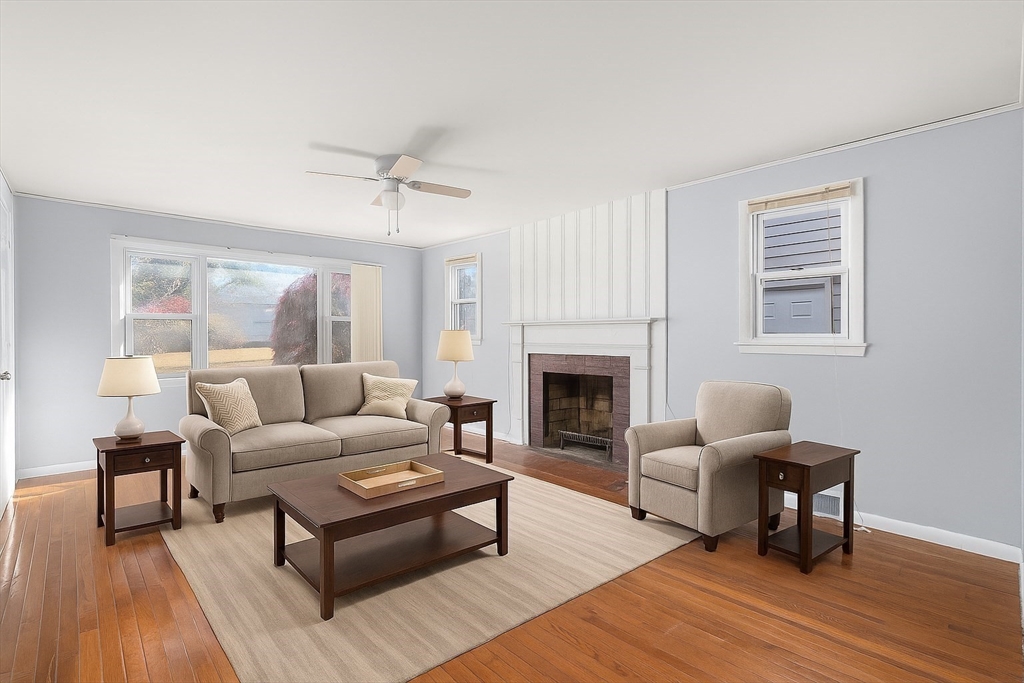 186 Bolton Street Springfield, MA 01119 - Photo 10 of 34 a living room with furniture and a fireplace