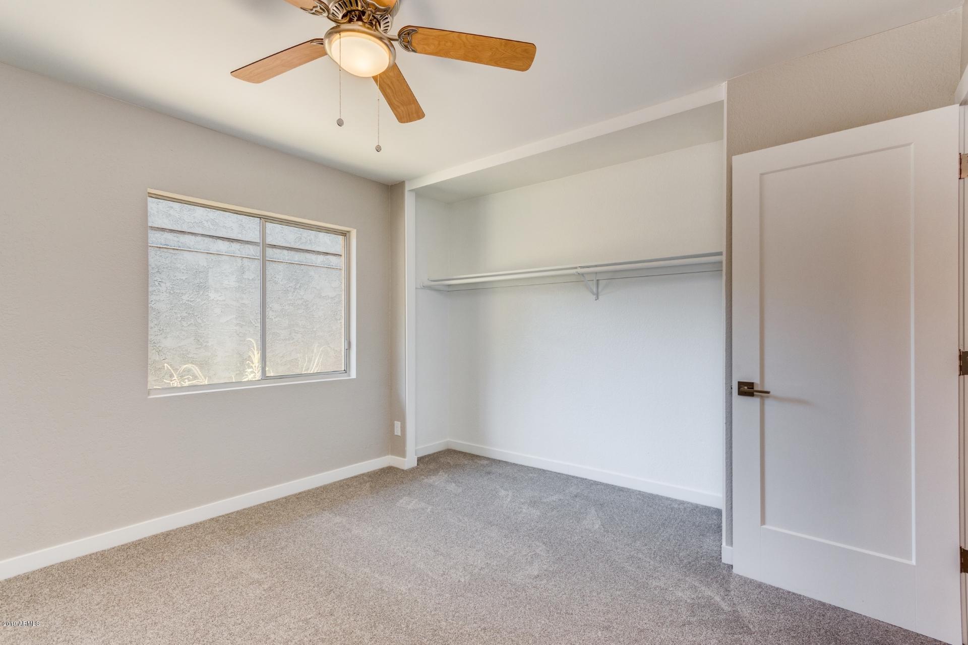 5503 South Rocky Point Road Tempe, AZ 85283 - Photo 12 of 22 a view of an empty room with a window
