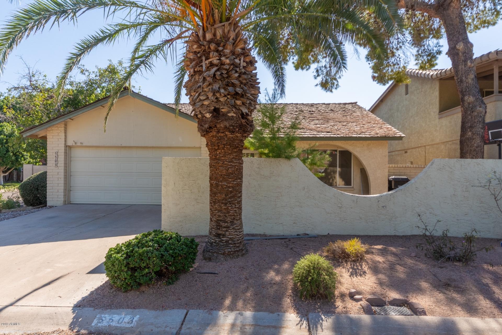 5503 South Rocky Point Road Tempe, AZ 85283 - Photo 22 of 22 a view of a house with a tree in front