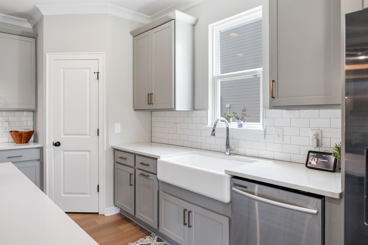 883 Plowson Road Mount Juliet, TN 37122 - Photo 20 of 47 a view of a kitchen with white cabinets