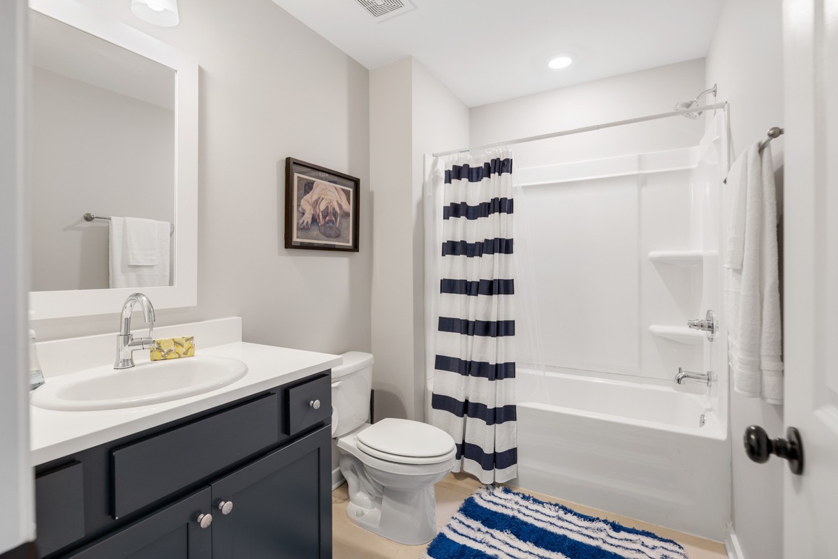 883 Plowson Road Mount Juliet, TN 37122 - Photo 39 of 47 a bathroom with a sink toilet and shower